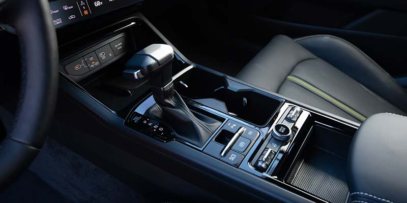 Car interior center console with gear shifter and controls